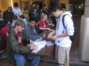 Members of the Cal Poly Amateur Radio Club check IDs of those who will be taking the Technician exam. [Marcel Stieber, AI6MS, Photo]